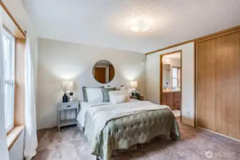 A well appointed, 3/4 en-suite bathroom adjoins the primary bedroom.