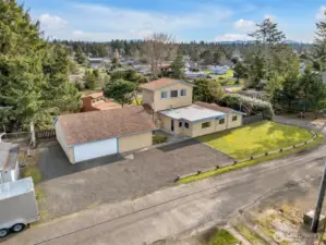 Two story home in Ocean Park with a detached garage & shop with ocean views.