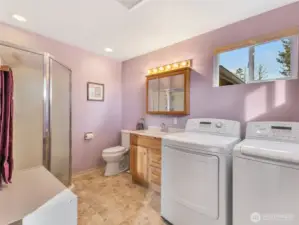 3/4 bath and laundry space off the dining room.