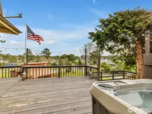 From the dining room slider out to the backyard. There is a large deck with hot tub as well as a spacious yard.
