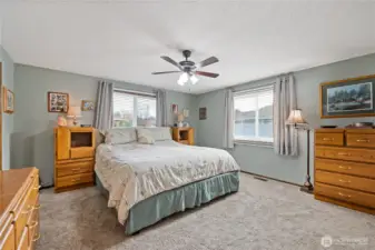 Primary bedroom with attached bathroom