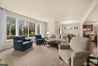 Open-concept design seamlessly connects the living room, dining area, and kitchen for comfortable everyday living and effortless entertaining.