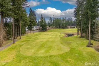 Beautiful fairway views offer a peaceful golf course setting right behind the home.