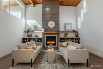 Even with 20 foot ceilings you can still cozy up to the fire place and enjoy your favoirte beverage