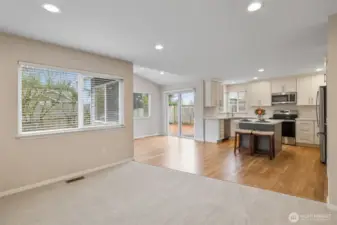 Family room looking to kitchen