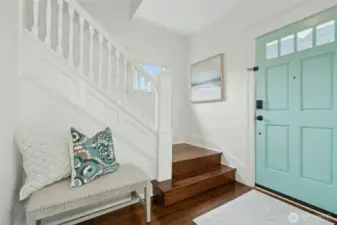 The entryway; the bottom stair riser hides a secret drawer.