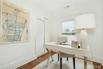 The 2nd floor bathroom has storage and plenty of space.