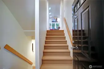 The homes features a split level entry taking you up to the main level or downstairs to a guest bedroom and two car attached garage.