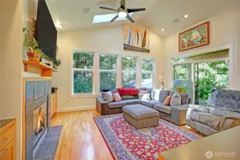 The vaulted ceilings provides a great open concept with natural brightness leading out to the covered porch.