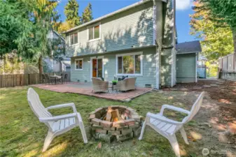 Firepit in the backyard and sideyard is also flat