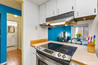 Kitchen overlooks Dining Area and Living Rm