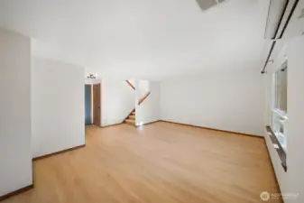 Another angle of the living room, looking toward the front door