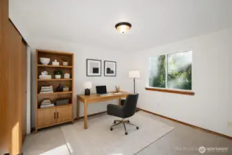 Bedroom #2, virtually staged here as an office. All new carpeting