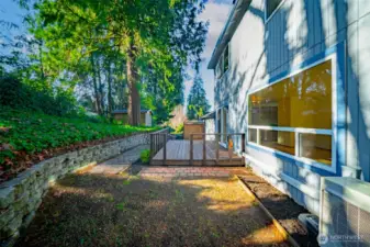 The rear yard is private, with a nice deck and storage shed