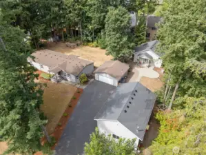 Main home, 2 detached garages, and ADU