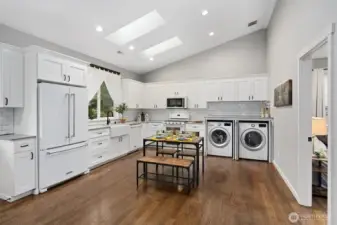 ADU hidden laundry area located in kitchen