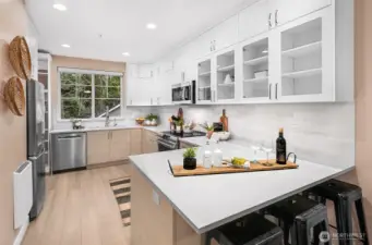 Kitchen fully redone with quartz countertops and soft close cabinets, perfect for cooking!
