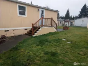 Showing backyard and back door.