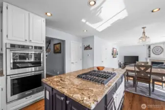 Stainless Kitchenaid dual oven, gas cook top, and dishwasher