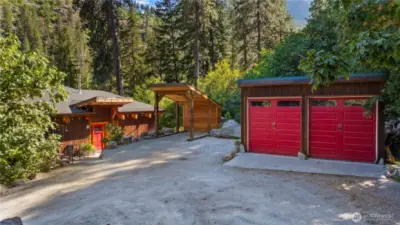 Offering level entry with a 2 car garage and carport.