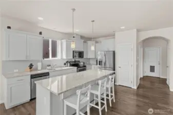 View of kitchen with bar space.
