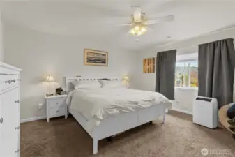 The primary bedroom with large five-piece bathroom.