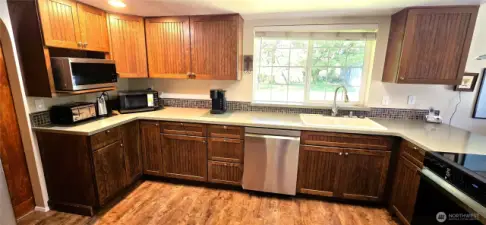 Kitchen with new appliances and walk-in pantry