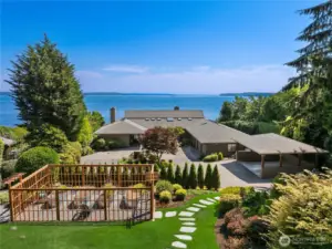 Welcome to BEANS BIGHT-The circular drive invites you through impeccably landscaped gardens to the home's elegant covered entry. There is plenty of parking for family and events. The raised cutting beds are fenced and irrigated.