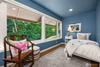 Just off the primary bedroom is this darling 2nd bedroom, perfect for a little close by.