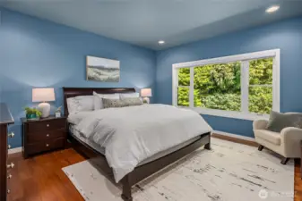 The guest wing features this lovely soothing bedroom and 3/4 bath. Pocket doors close off the the entire guest wing for optimal peace and privacy.