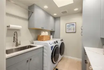 The separate laundry room is newly remodeled.