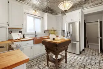 This cozy kitchen with high ceilings are what craftsman home dreams are made of
