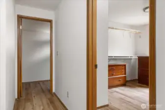 Down the hall from Primary Bedroom are 2 more bedrooms