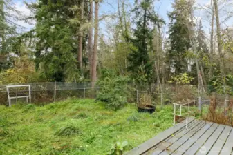 Area around back deck is fenced in