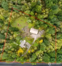 Property is surrounded by trees, providing privacy from neighbors