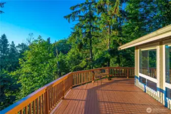 Deck has olenty of earth under the deck - its an illusion with the photos great views and storage is under the deck and inside the crawlspace of the house which is NEW!