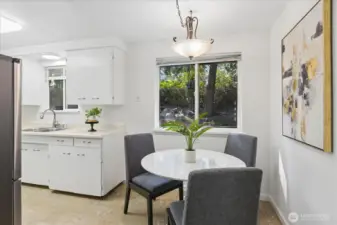 Dining room adjacent to kitchen.