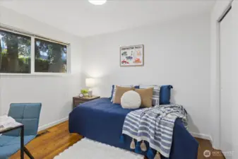 2nd bedroom has hardwood flooring and faces the private back yard.