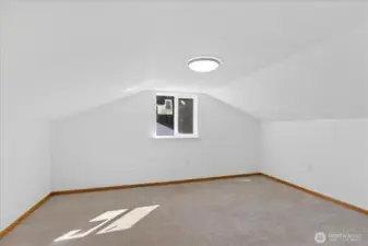 upstairs is a large bedroom which offers so many options.  Fresh paint and new carpet.