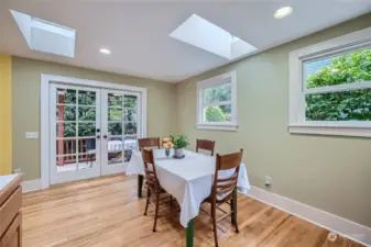 Great room with French Doors leading out to the back covered deck making it feel like its part of the home