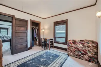 Primary suite with great wood work.