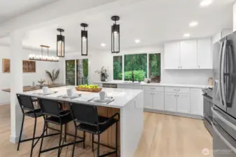 Kitchen area has great flow and center island is incredible.  Custome features throughout with all new hardware, cabinets, counters, appliances and more.