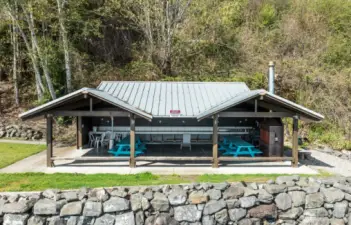 Community cabana with sinks, running water, BBQs, tables, etc