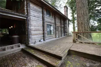 Main level deck wraps all the way to the hot tub