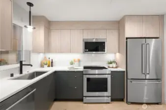 A full suite of premium appliances and abundant prep space make this kitchen both stylish and functional.