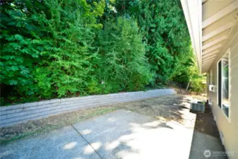 new retaining wall under green belt.