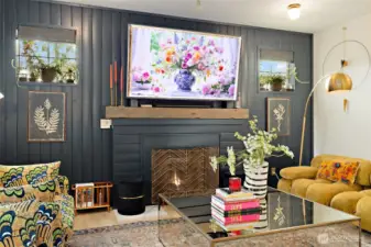 Another look at the stunning fireplace area—a space that invites connection, celebration, and comfort. Whether you're gathering with friends and family to share stories and laughter, or enjoying a quiet evening curled up in the peaceful glow of home, this room was designed to hold life’s everyday moments and meaningful memories alike.
