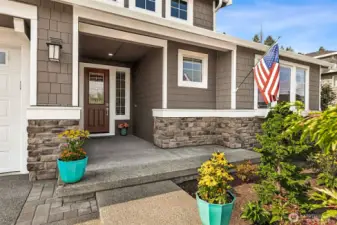 This home features an inviting front porch