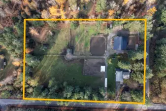 Aerial photos show the thoughtful layout utilizing the full property. Five different entrances make it easy access for deliveries as well as trailer/RV access.