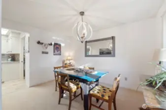 The formal dining area has country charm and is located right off of the kitchen for easy entertaining.